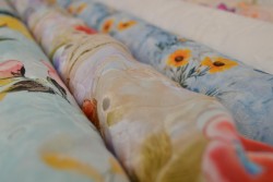 Baumwollstickerei mit Motiven